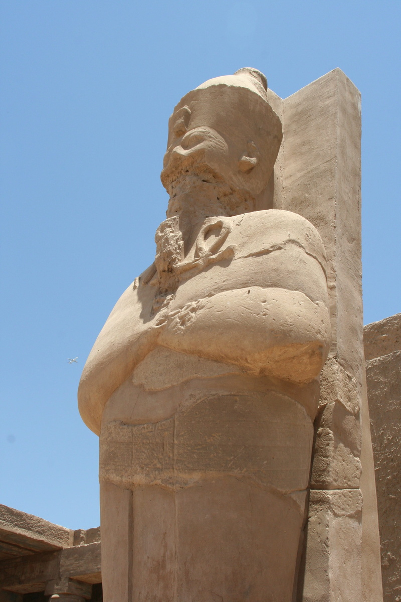 karnak temple, male likeness, wall, representation, ancient, blue sky, ancient civilization, outdoors, craft, pharaoh, art and craft, art, spirituality