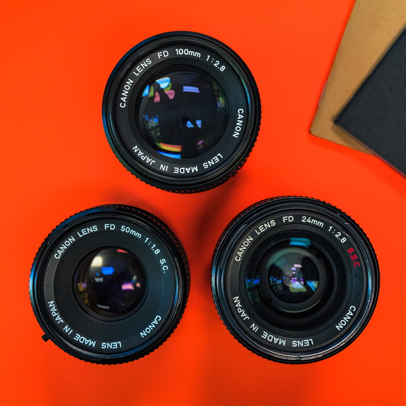 lenses, close-up, text, photo, equipment, cannon fd, layout, vintage, 100mm, f2.8, photography themes, digital camera, technology, retro, camera, western script