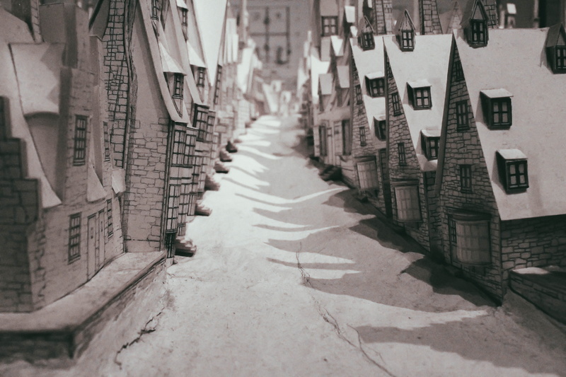 outdoors, no people, city, architecture, built structure, winter, houses, building exterior, spirituality, day, building, in a row, hanging, hogwarts, village