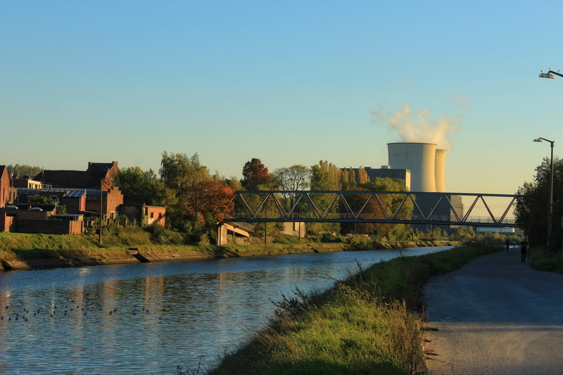 smoke stack, air pollution, no people, day, built structure, architecture, cooling tower, water, lying, path, emitting, 5K, outdoors, bridge, pollution