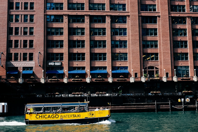 blue, cab, yellow, window, il, building exterior, green, waterfront, no people, river, sky, architecture, building, illinois, boat, transportation, bridge