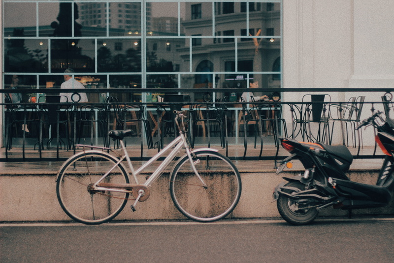 wheel, asphalt, railing, royal city vincom mega mall, vietnam, person, road, street, bicycle, outdoors, land vehicle, window, sports, white, 5K, no people