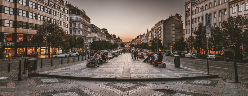building, city life, roads, lights, the way forward, cobblestone, trees, houses, bench, vehicles, sky, built structure, people, benches, pavement, incidental people