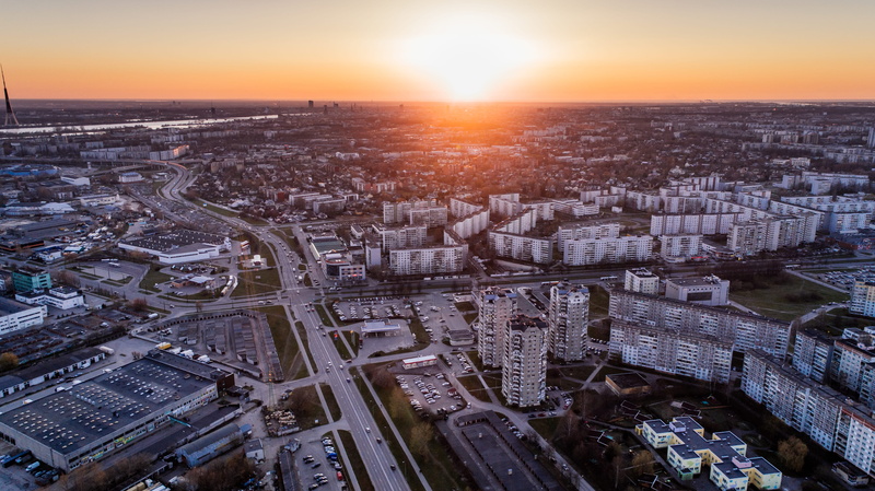 daylight, high angle shot, sunset, cityscape, sun, traffic, architecture, landscape, transportation system, water, cars, buildings, city life, roofs, built structure
