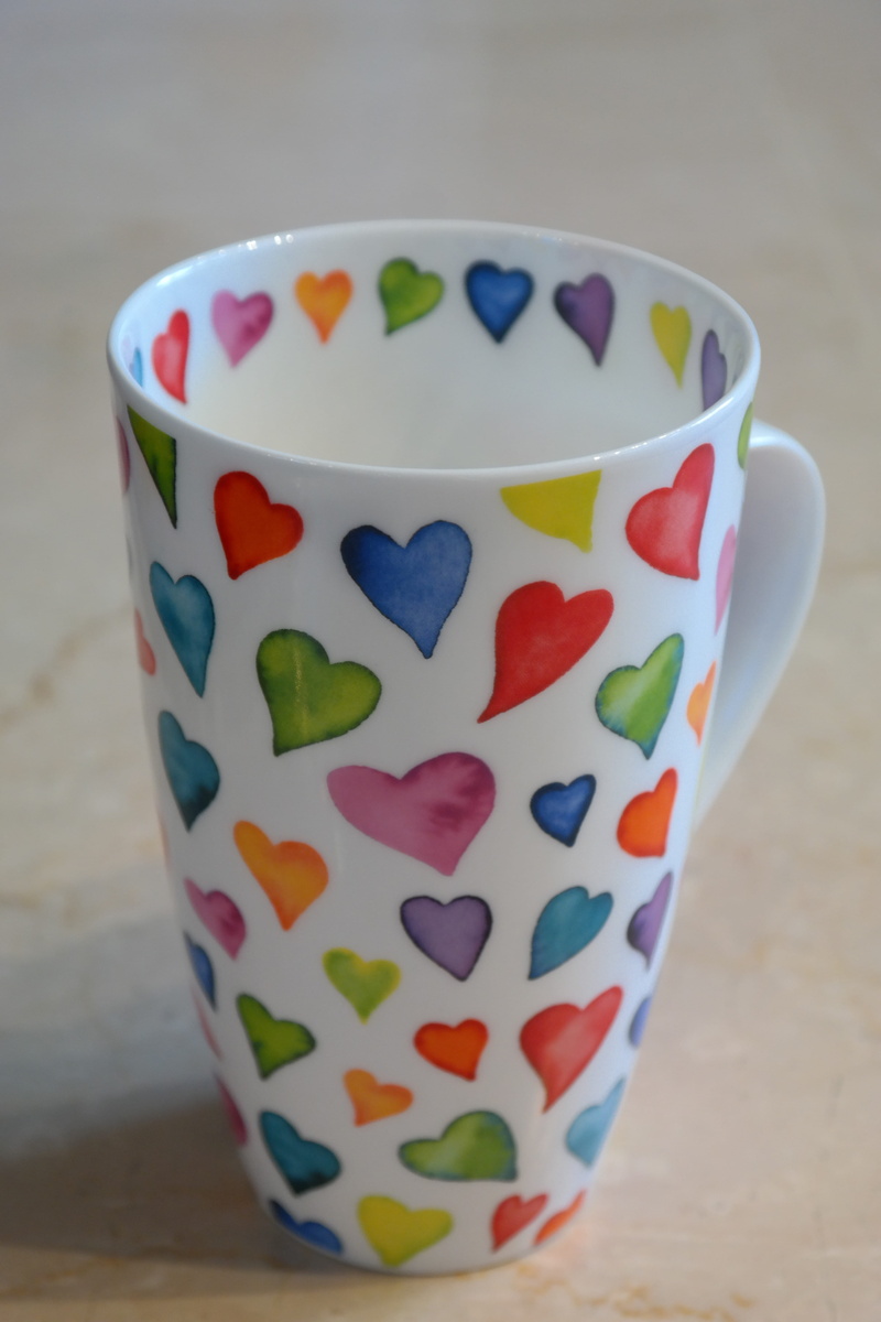 mug, wall - building feature, pattern, food and drink, creativity, floral pattern, design, wood - material, color, focus on foreground, hearts, sweetheart cup