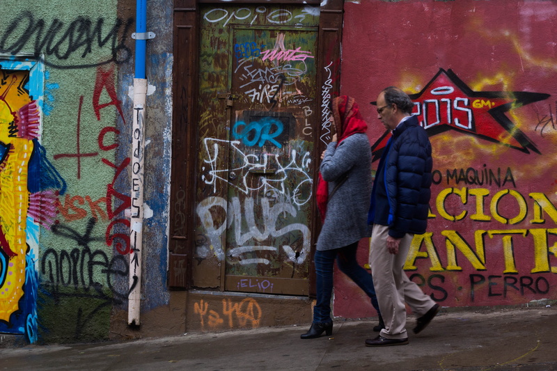 mural, street art, text, wall - building feature, communication, street, creativity, real people, lifestyles, one person, hood - clothing, casual clothing