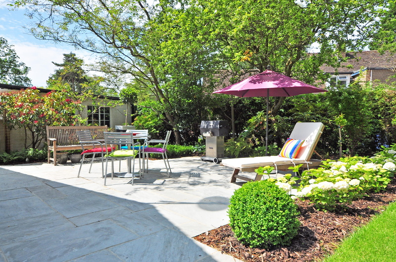 environment, exterior, built structure, sunlounger, yard, near, tree, plant, sunlight, no people, chair, umbrella, sun lounger, table, park, green, trees