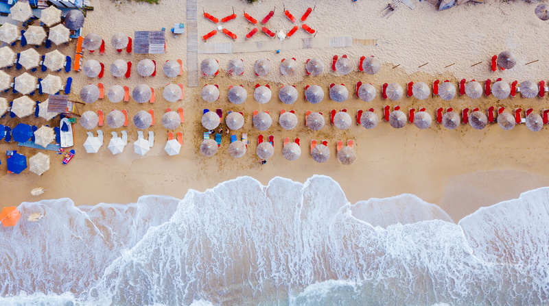 sea, patio, architecture, blue, red, girl, seashore, person, wave, celebration, nature, view, tide, outdoors, aerial, in a row, coastal, daytime, vacation