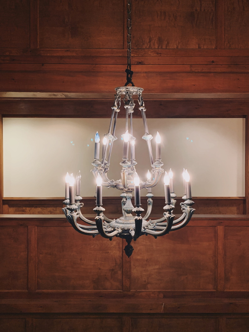light, hanging, black, furniture, decoration, flooring, sideboard, room, chandelier, bronze, hardwood, wall - building feature, kitchen island, cabinet