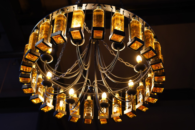jewelry, metal, black background, luxury, market, light fixture, lighting, shop, carnival, no people, arts culture and entertainment, illuminated, bushmills