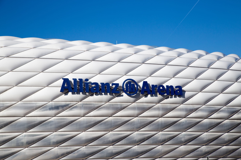 art and craft, roof, pattern, building exterior, banner, couch, nature, arena, building, plant, stadium, day, fruit, women, sunlight, crowd, clear sky