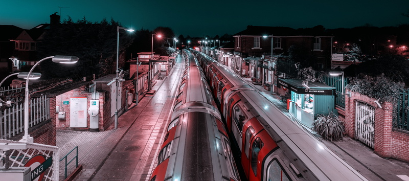 train station, trains, city life, terminal, light, outdoors, freight car, train track, transportation, night, land vehicle, high angle view, street light