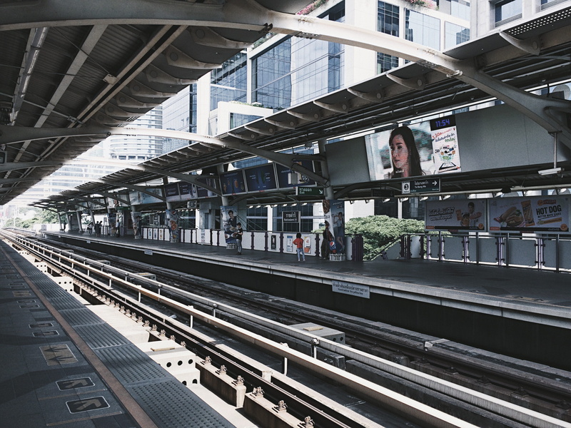 railroad station platform, building, transportation, train station, railroad track, building exterior, public transportation, subway, real people, city