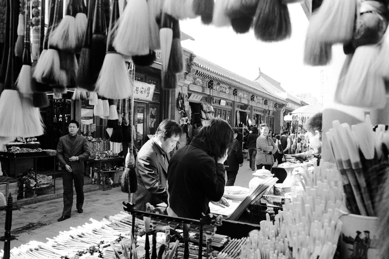 chair, shopping, real people, photography, consumerism, human, musician, architecture, pedestrian, face, business, person, retail, cafe, adult, street market