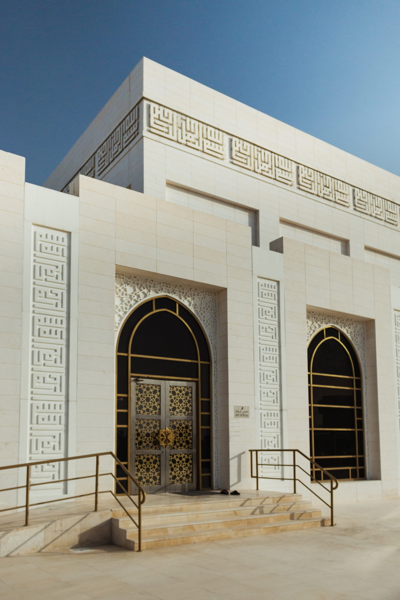 arch, amina bint ahmad al ghurair mosque, planetarium, temple, banister, sky, railing, built structure, handrail, outdoors, cultural, clear sky, history
