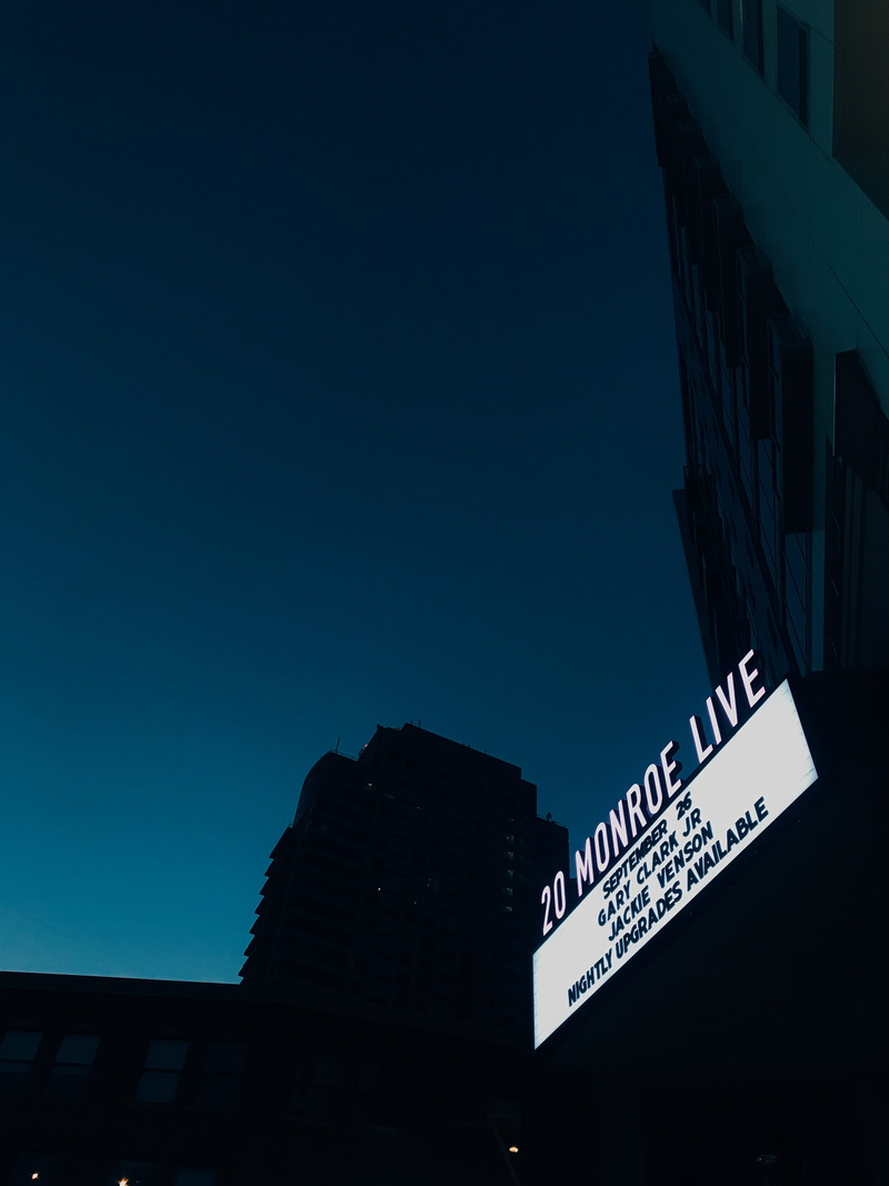 architecture, script, clear sky, outdoors, night, photo, monroe, live, information, direction, guidance, text, building exterior, nature, angle, sign, signage