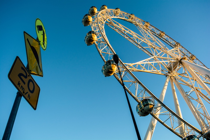 blue, leisure activity, amusement park ride, no people, ferris wheel, travel destinations, street lamp, street sign, photography, transportation, walk