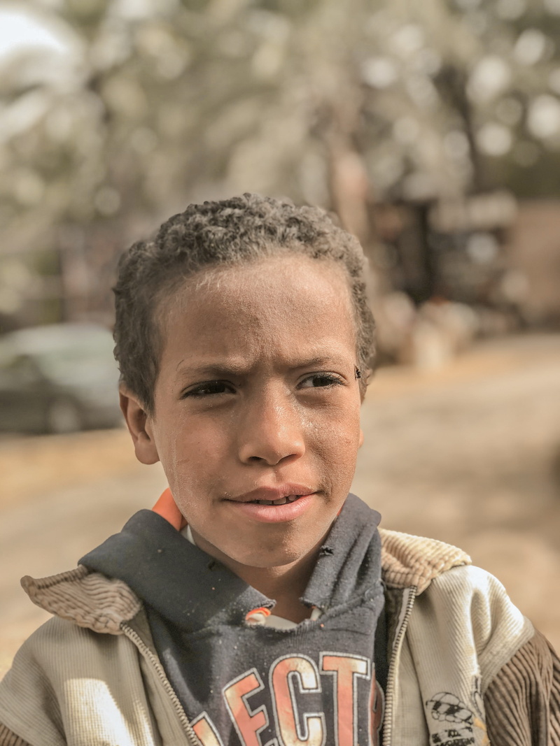 child, men, real people, adult, front view, teenager, males, egypt, one person, archaeology, face, military uniform, person, finger, close-up, portrait