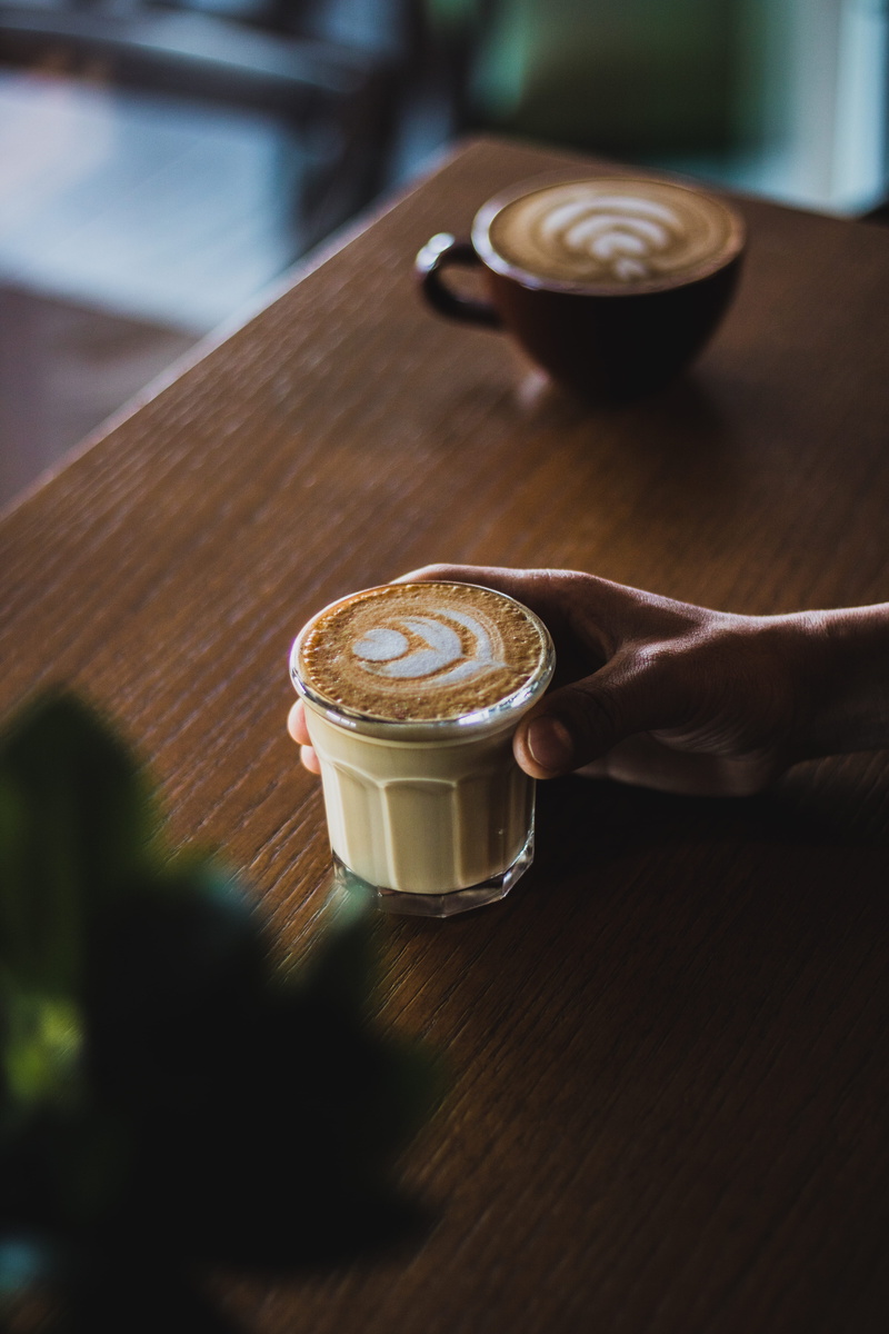 non-alcoholic beverage, saucer, coffee, pottery, juice, human, food and drink, coffeetea fusion cafe, still life, united arab emirates, freshness, wood - material