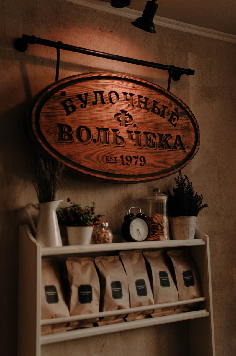text, alcohol, wall - building feature, plywood, message, indoors, vase, number, western script, 4K, capital letter, wood - material, communication, still life