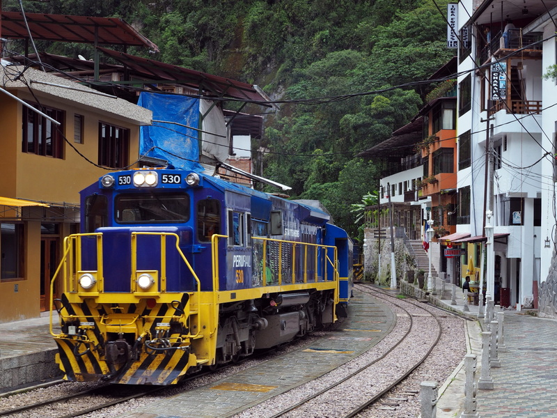 2K, city, railroad track, no people, train - vehicle, building exterior, mode of transportation, jungle, plant, architecture, tree, day, public transportation