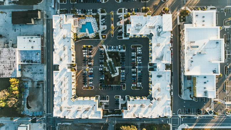 computer chip, daytime, technology, photography, white, car, aerial view, residential district, building, high angle view, outdoors, architecture, built Structure