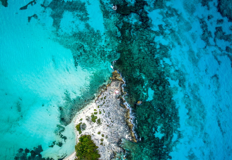 outdoors, island, motion, land, aerial view, near, water, rock - object, from above, day, drone, 4K, sport, turquoise colored, aquatic sport, group of people