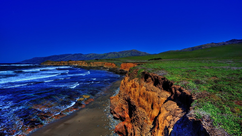 outdoors, hills, water, coast, no people, beauty in nature, sky, travel destinations, scenics - nature, beach, tranquility, clear sky, non-urban scene