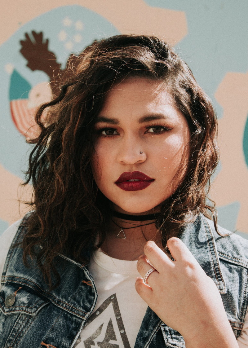 beautiful woman, nose, lifestyles, headshot, contemplation, selfie, wall, portrait, adult, latina, one person, young adult, looking at camera, nose piercing