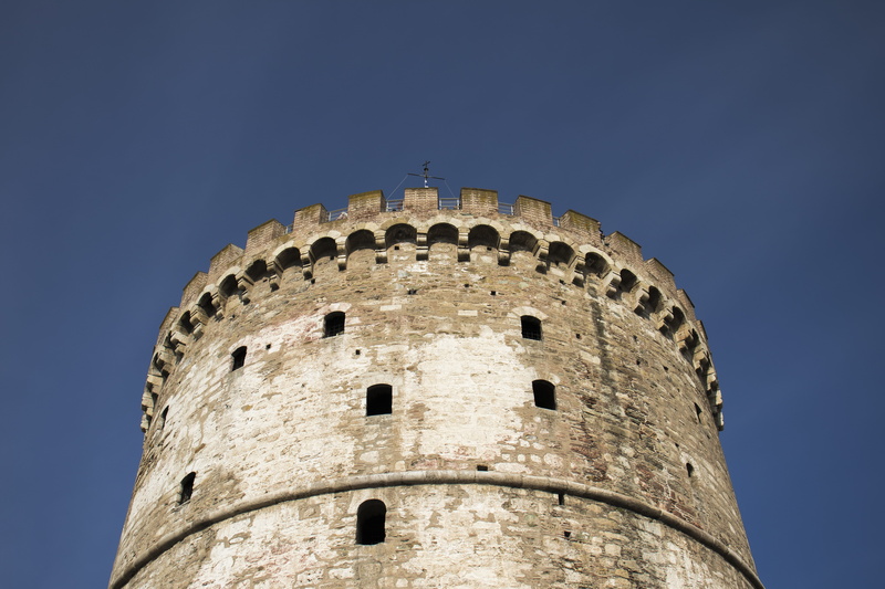 arched, old, castle, tower, greece, clear sky, wall, day, tourism, bird, brick, street photography, animal, building, the past, thessaloniki, no people
