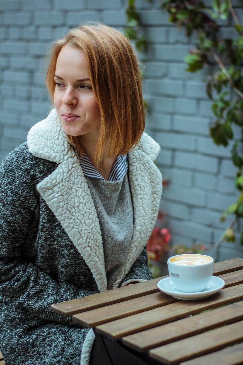 coffee, adult, hairstyle, refreshment, front, woman, real people, cardigan, photo, cup, furniture, sweater, drink, table, saucer, pottery, 5K, portrait