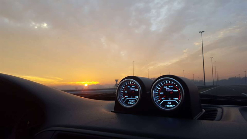vehicle interior, transportation, dashboard, beautiful, windshield, road, land vehicle, illuminated, oil temp, mode of transportation, sun, air vehicle