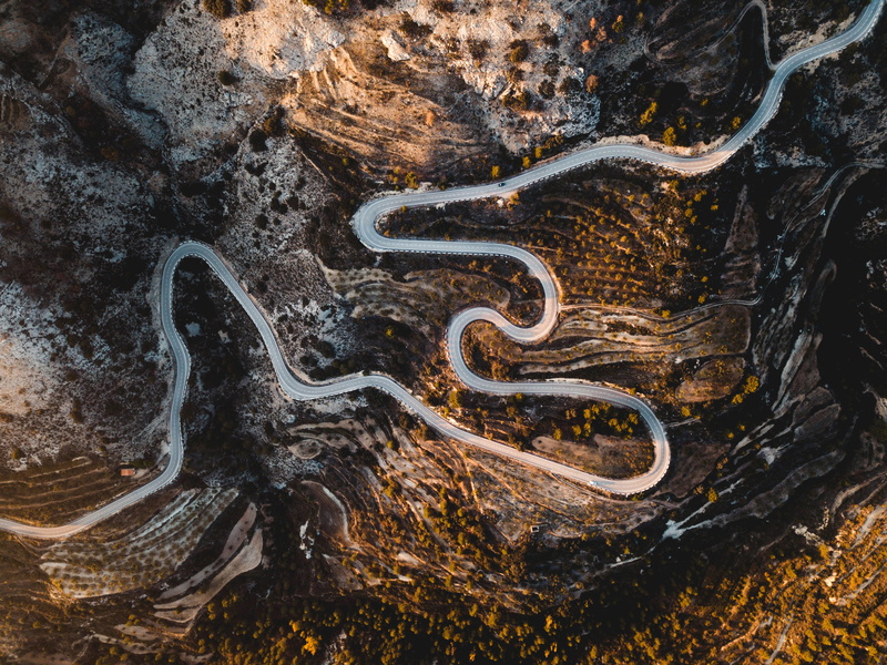 day, solid, gold, hairpin, tranquility, cliff, drive, driving, winding road, snake, landscape, roadtrip, illuminated, light, sunset, transportation, beauty in nature