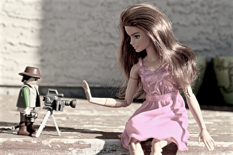 daytime, leisure activity, lifestyles, bothering, women, film, pink, two people, child, female, outdoors, privacy, innocence, paparazzi, photographing