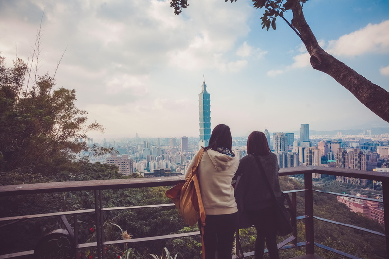 adult, building exterior, leisure activity, travel destinations, taipei 101/world trade center, togetherness, city, outdoors, taipei 101, two people, architecture