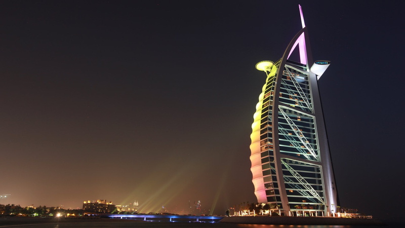 office building exterior, travel destinations, tower, architecture, tall - high, luxury, city, Burj Al Arab, skyscraper, night, modern, nature, building exterior
