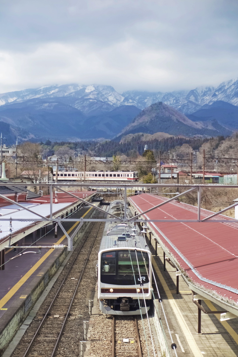 transportation, train, travel, land vehicle, nikkō-shi, public transportation, mountain, nature, japan, railway, outdoors, built structure, city, track