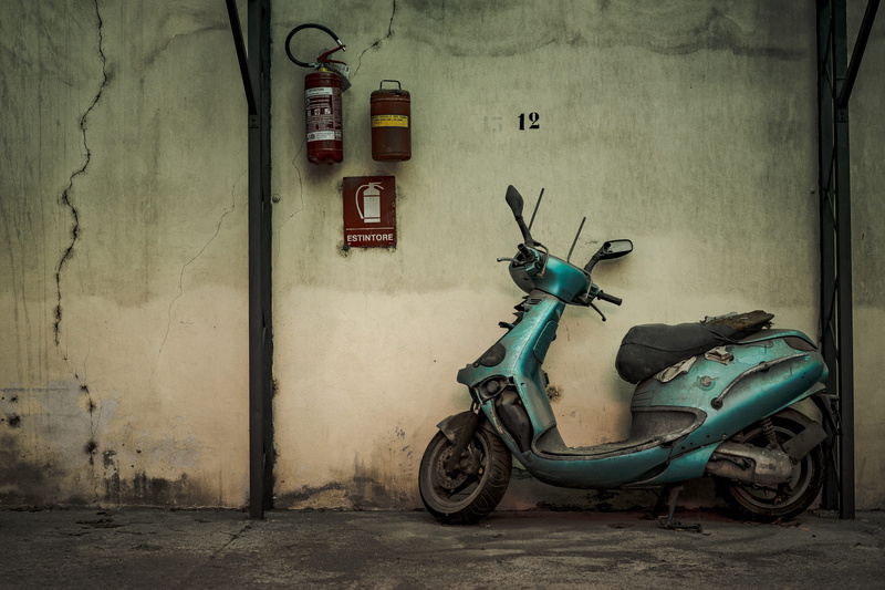land vehicle, no people, ruin, wall, motor scooter, automatic, abandoned, moped, texture, built structure, scooter, dust, teal, building exterior, motorbike