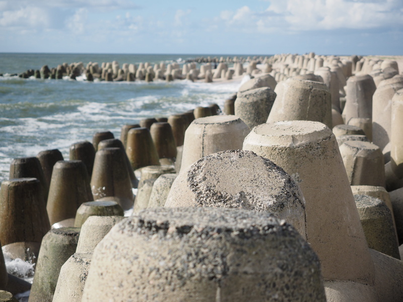 sylt, sea, scenics - nature, nature, sunlight, hörnum, outdoors, sand, focus on foreground, hard, tranquil scene, tetrapods, concrete, the beach fixing