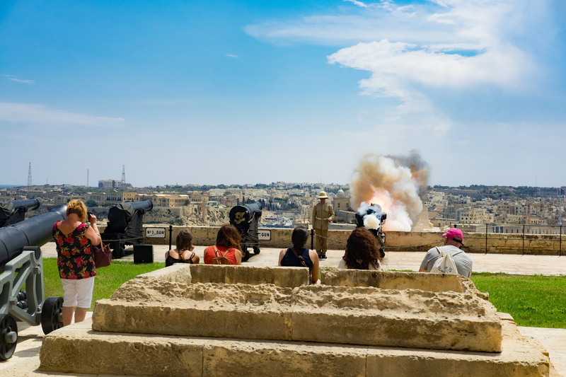 valletta, architecture, malta, sky, military, women, large group of people, history, people, smoke - physical structure, leisure activity, real people