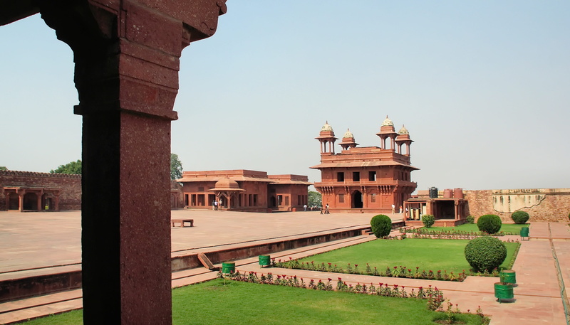no people, travel, built structure, palace, ancient civilization, travel destinations, red sandstone, clear sky, architectural column, outdoors, nature