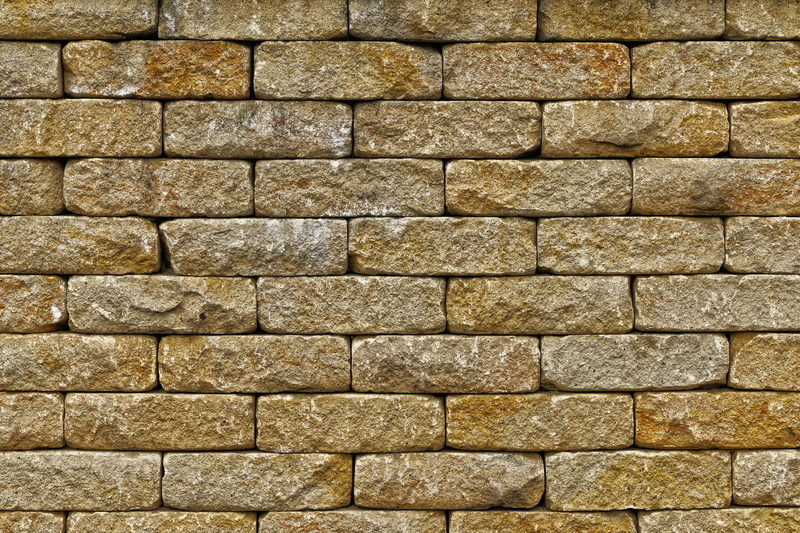 surface, masonry, pattern, abstract, close-up, backgrounds, natural stone wall, shape, brick, privacy, outdoors, no people, grain, built structure, large group of objects