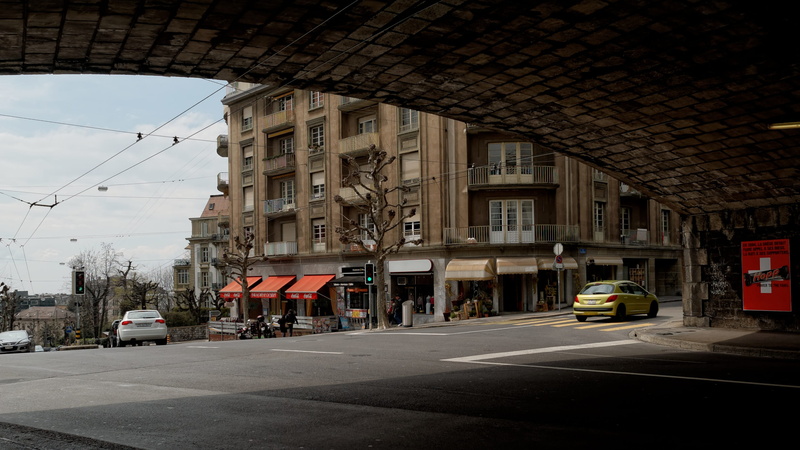 building, ouchy, architecture, built structure, music, land vehicle, sky, skyscraper, switzerland, city life, motor vehicle, lausanne, vaud, building exterior