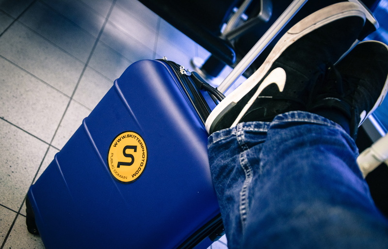 foot, personal perspective, body part, international, sign, trolley, people, one person, man, 5K, travel, shoe, trip, blue, resting, suitcase, terminal