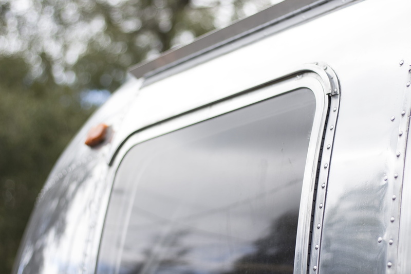 airstream, metal, windshield, car door, focus on foreground, close-up, window, glass - material, motor vehicle, leaving, business, mode of transportation