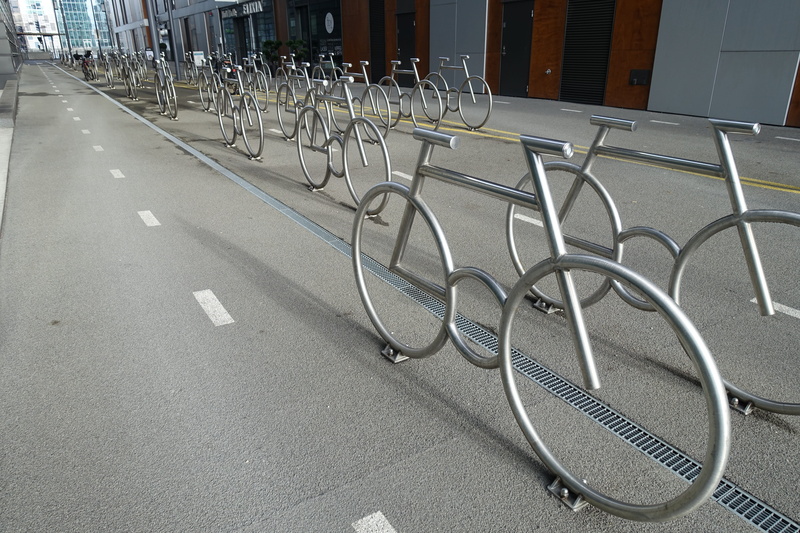 5K, biking, side by side, in a row, transport, absence, road, street, Parking, city, outdoors, day, Road, protection, metal, large group of objects, built structure
