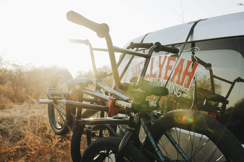land vehicle, tied, transport, nature, field, stationary, several, sunlight, 5K, wheel, bike, suv, rural scene, sky, land, bmx, landscape, outdoors, bicycle