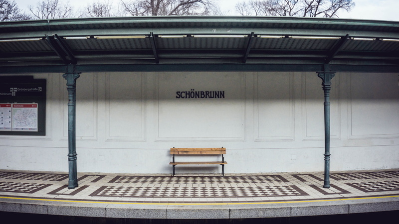 rail transportation, western script, architecture, day, bench, text, seat, railroad station, built structure, train, communication, wall - building feature