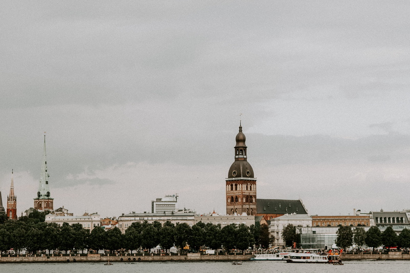 government, riga, architecture, history, cloud - sky, place of worship, day, water, religion, spire, latvia, travel destinations, spirituality, built structure