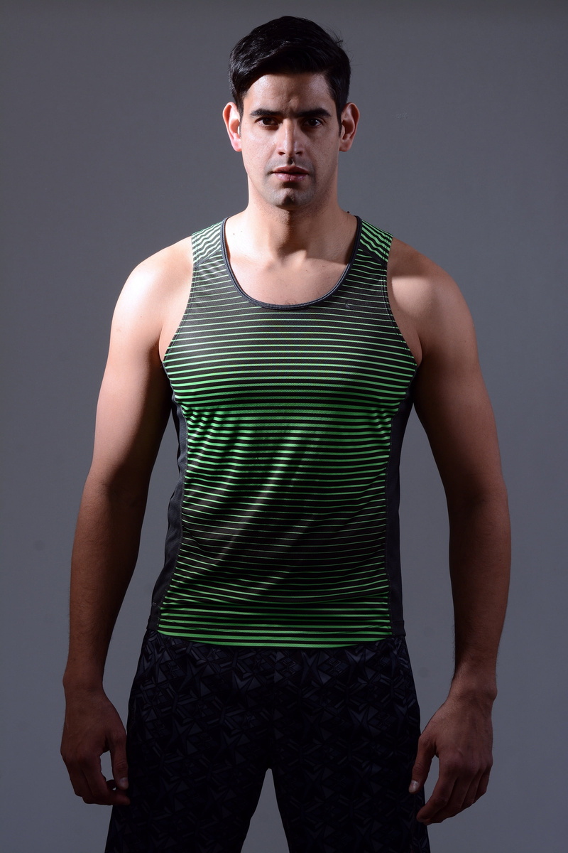 front view, black, green, 2K, bottoms, adult, masculinity, three quarter length, man, looking at camera, clothing, fashion, wearing, fitness trainer, lifestyles